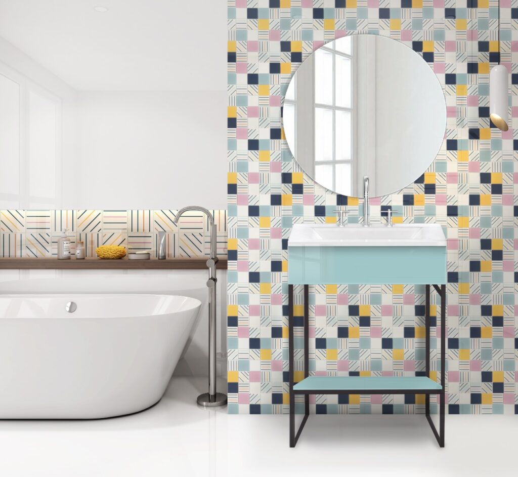 Baño con revestimiento de vidrio de cuadros de colores y espejo redondo